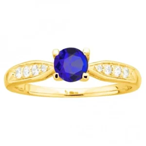 Bague empierrée taille 54 pl.or oxydes de zirconium et spinelle bleu plaqué or jaune